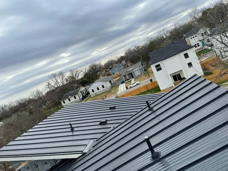 Standing seam metal roof panels with vents for Skylight Repair in Schaumburg